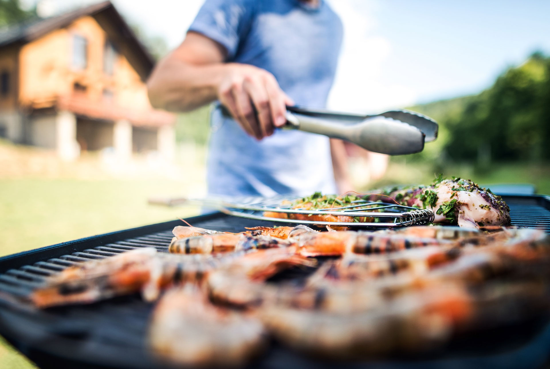 barbecue man cooking tongs